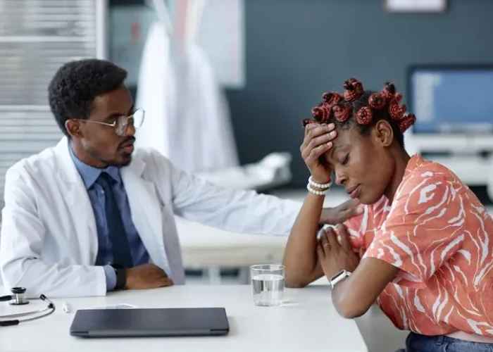 Psychiatrist comforting a patient during an anxiety disorder treatment session in Katy, Texas