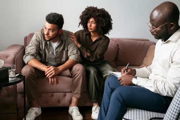 Couple attending a counseling session with a licensed therapist